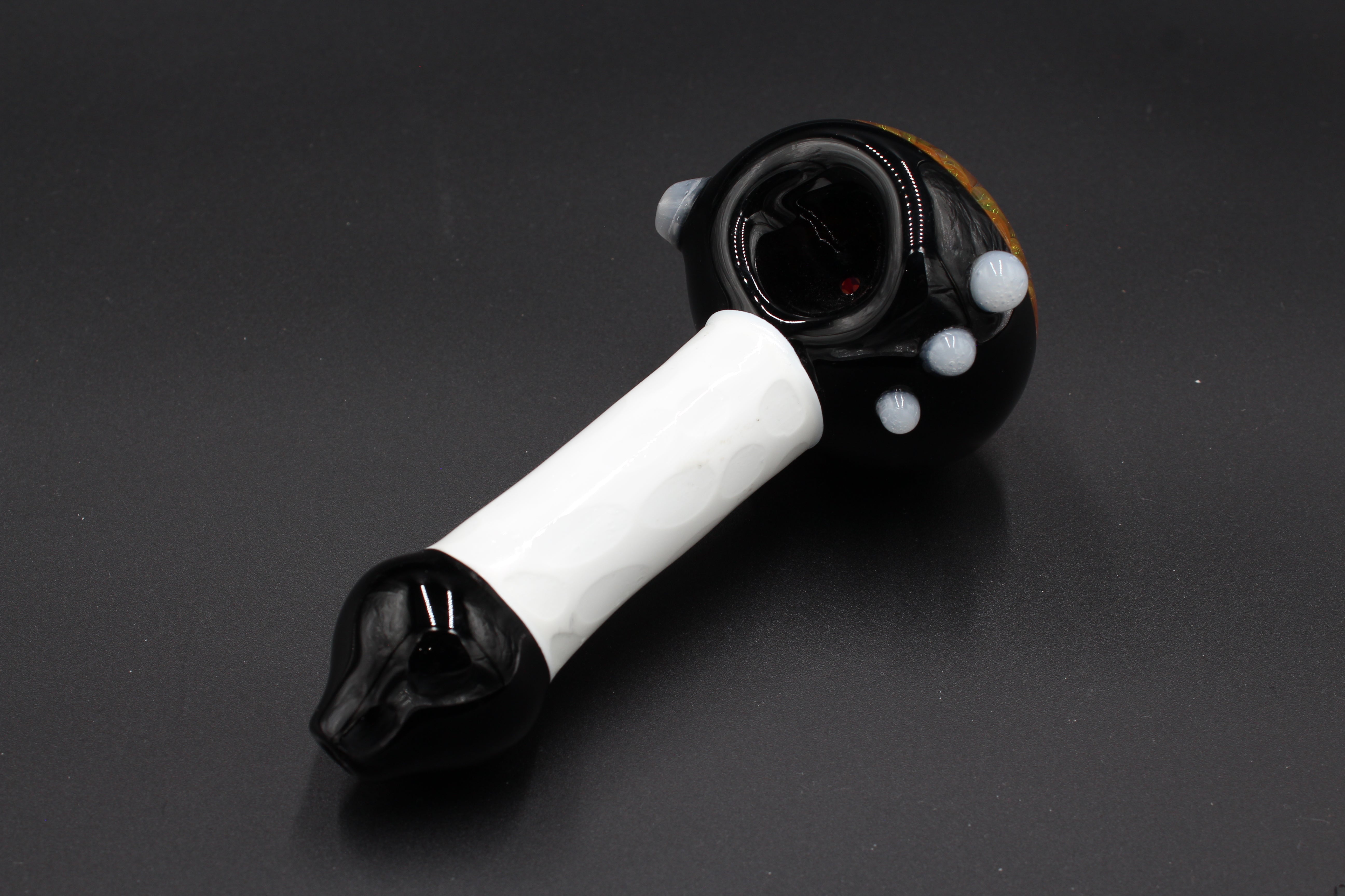 White/Black Spoon Pipe w/ Colorful Marble offset left