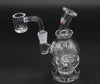 Stokes Glass "Fab Egg" Mini Dab Rig to the left